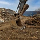 Wide Hydraulic Thumb for sale Scooping Dirt - Rockland Manufacturing