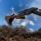 Wide Hydraulic Thumb for sale Scooping Dirt - Rockland Manufacturing