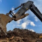 Wide Hydraulic Thumb for sale Scooping Dirt - Rockland Manufacturing