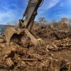 Wide Hydraulic Thumb for sale Scooping Dirt - Rockland Manufacturing