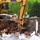 Excavator Rakes for sale Scooping Rubble - Rockland Manufacturing